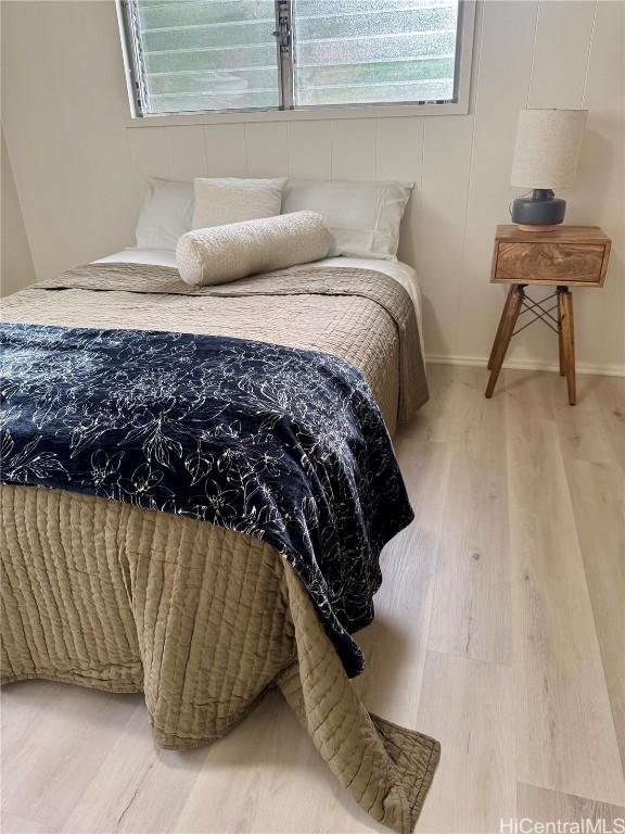 bedroom featuring hardwood / wood-style flooring