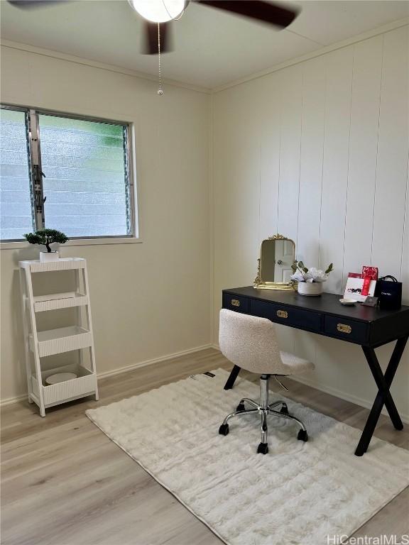 office featuring light wood finished floors and baseboards