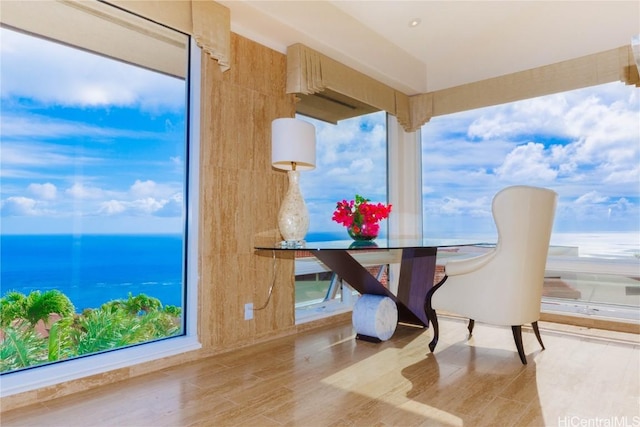 dining space with a water view