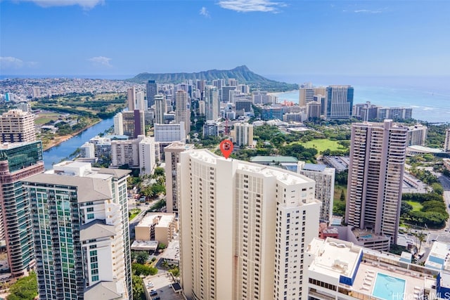 aerial view featuring a city view and a water view