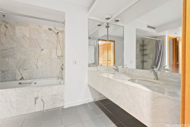 bathroom with tile patterned flooring, vanity, and shower / bathtub combination with curtain