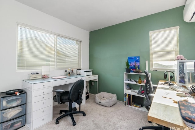 carpeted office with an AC wall unit and a wealth of natural light