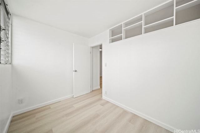 empty room with light wood-type flooring