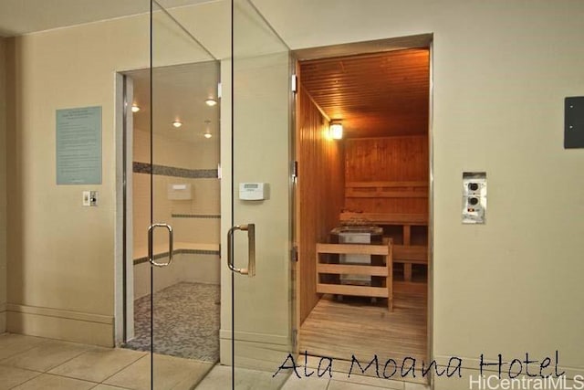 view of sauna / steam room featuring tile patterned floors