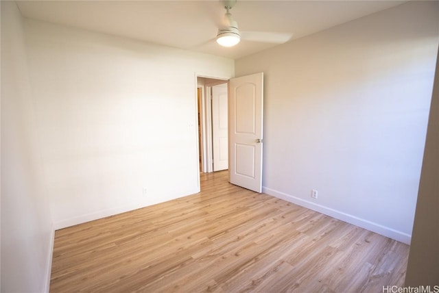 unfurnished room featuring light hardwood / wood-style flooring and ceiling fan