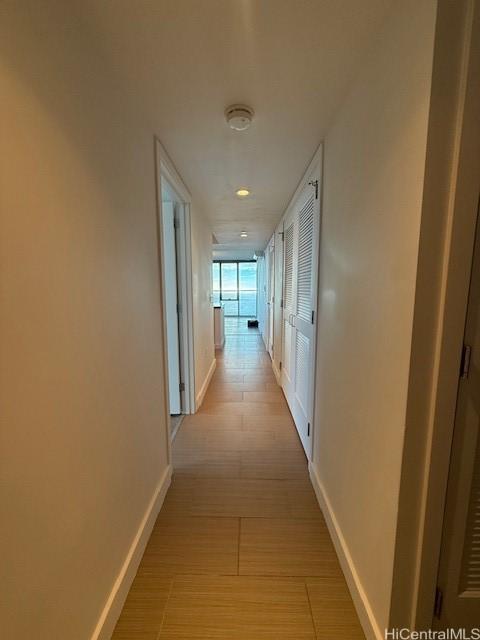 hallway featuring light wood-type flooring