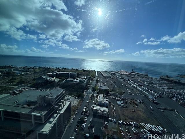 birds eye view of property with a water view