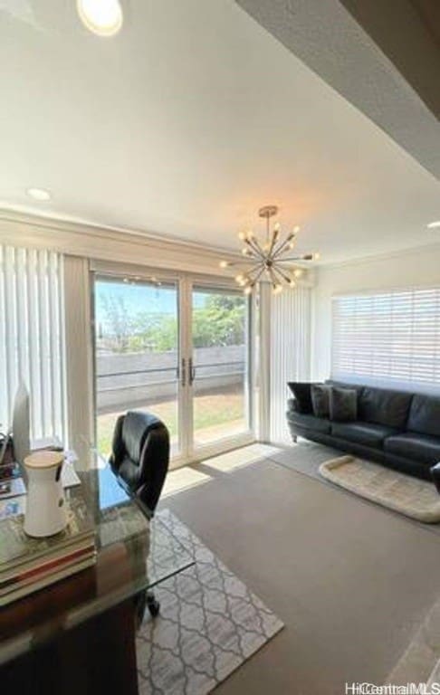 interior space with french doors and an inviting chandelier