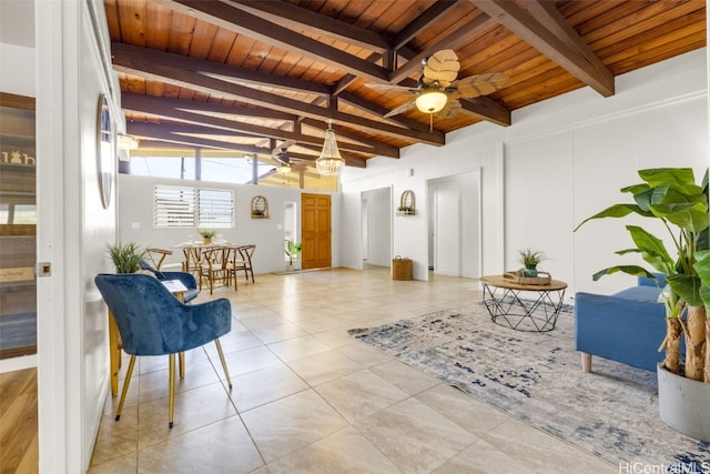 sitting room with light tile patterned floors, lofted ceiling with beams, ceiling fan, and wood ceiling