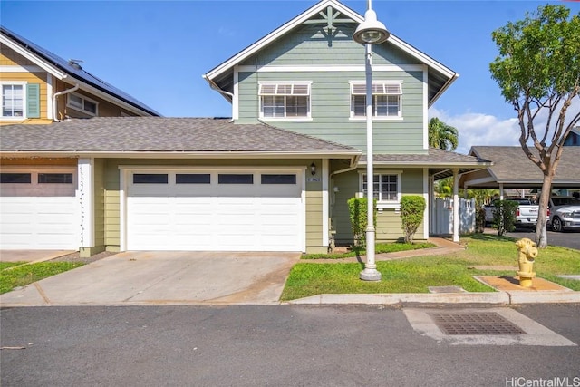 view of front of property with a garage