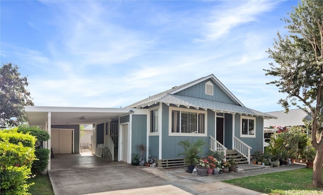 view of front facade with a carport