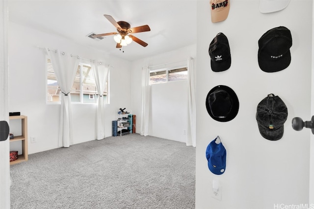 miscellaneous room featuring carpet and ceiling fan