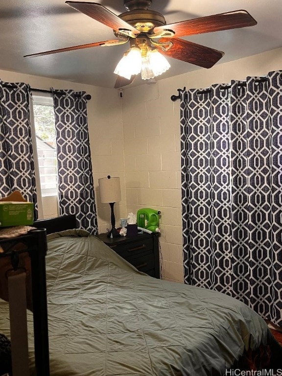 bedroom featuring ceiling fan