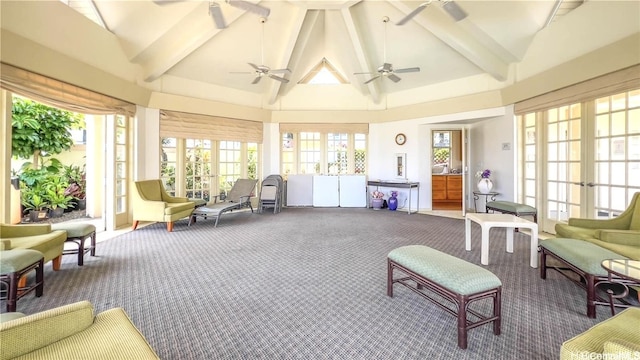 sunroom / solarium with vaulted ceiling with beams and french doors