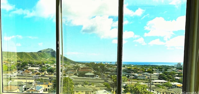 doorway to outside featuring a water view