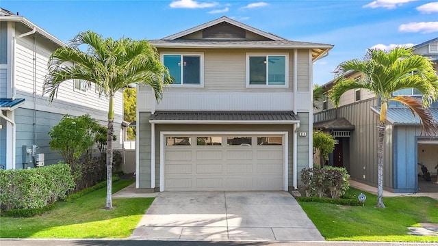 view of front facade featuring a garage and a front yard