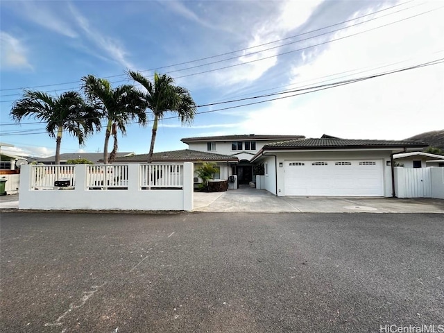 view of front of property featuring a garage