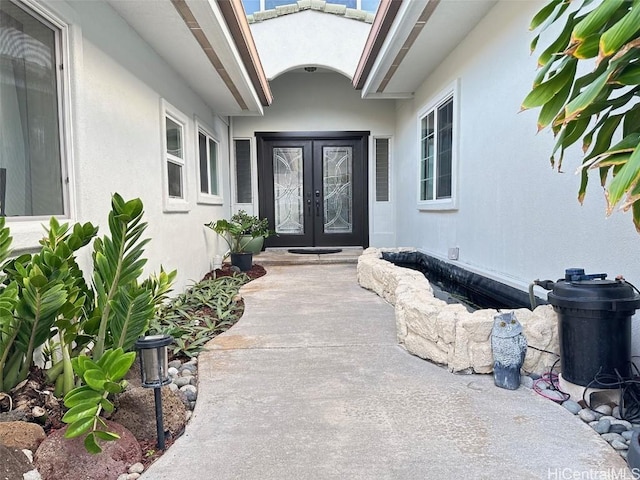 property entrance featuring french doors