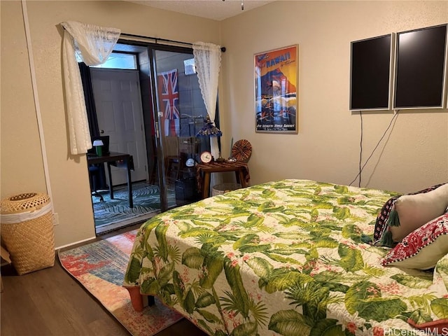 bedroom featuring hardwood / wood-style flooring