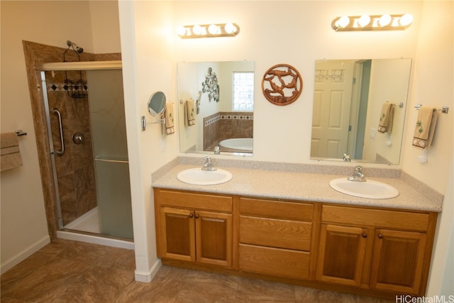 bathroom featuring vanity, tile patterned flooring, and plus walk in shower