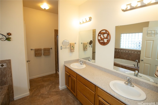 bathroom featuring vanity, tile patterned floors, and a bathtub