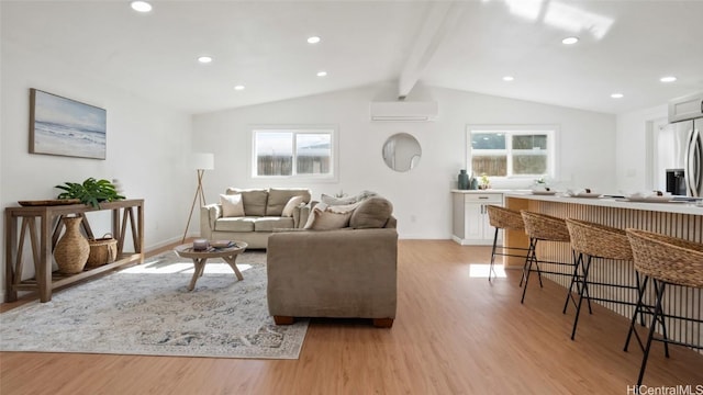 living room with light wood-type flooring, a wall unit AC, and lofted ceiling with beams