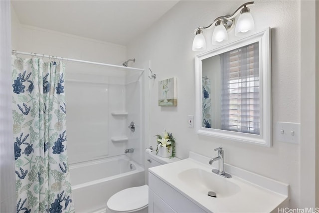 full bathroom with vanity, toilet, and shower / bath combo