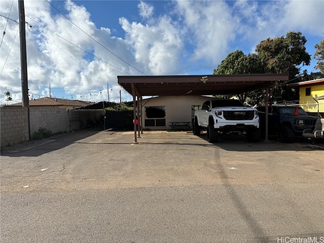 view of car parking with a carport