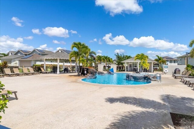 view of pool featuring a patio