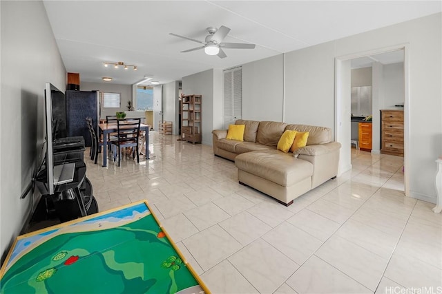 living room with ceiling fan