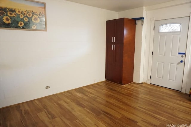 spare room with hardwood / wood-style floors