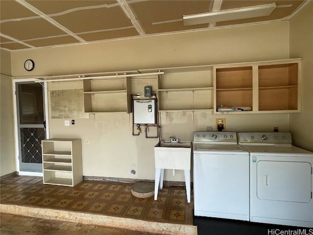 laundry area featuring washing machine and clothes dryer