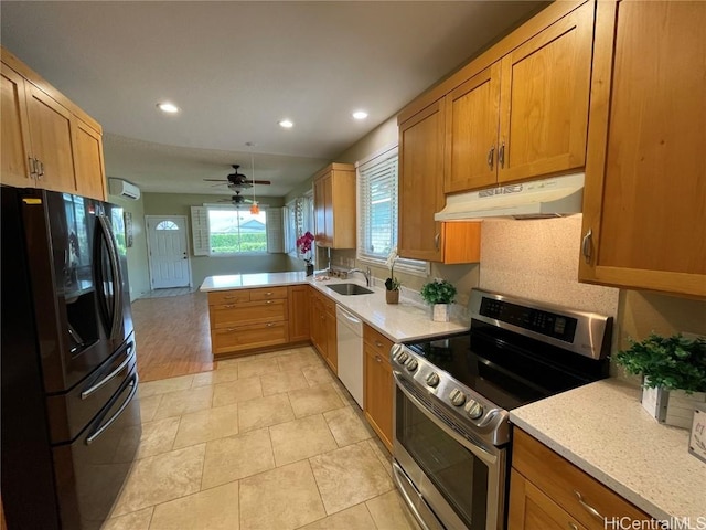 kitchen featuring stainless steel electric range, white dishwasher, ceiling fan, black fridge with ice dispenser, and kitchen peninsula