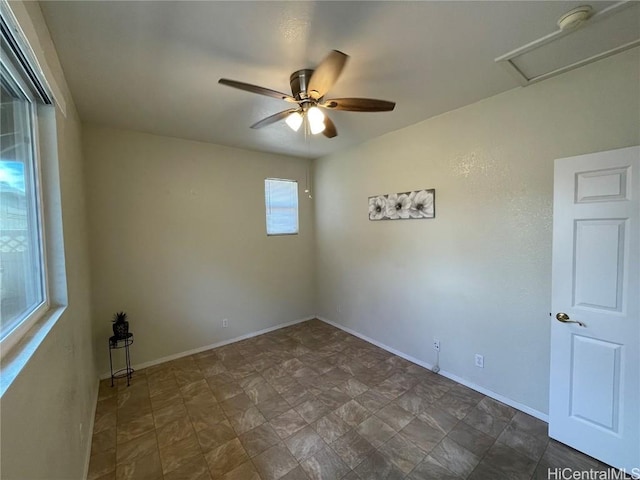 empty room featuring ceiling fan