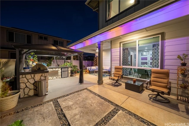 view of patio / terrace with an outdoor hangout area and area for grilling