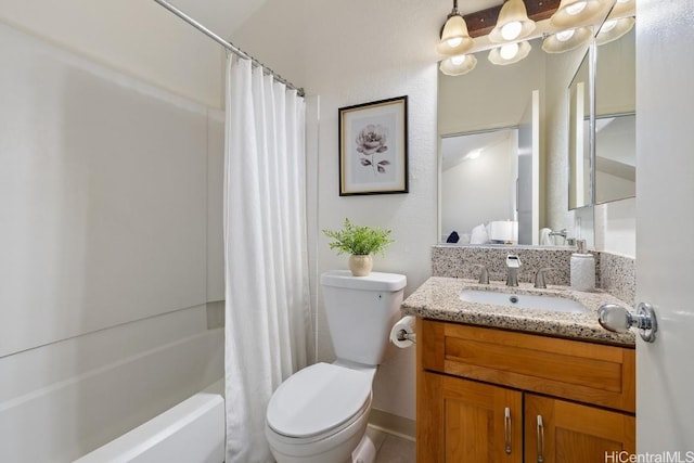 full bathroom with vanity, toilet, and shower / tub combo with curtain