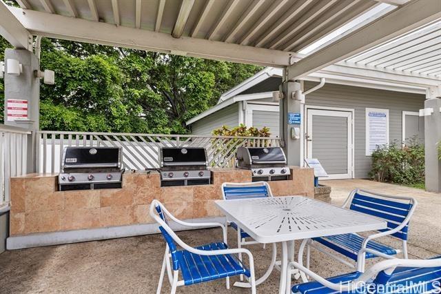 view of patio / terrace featuring an outdoor kitchen and area for grilling