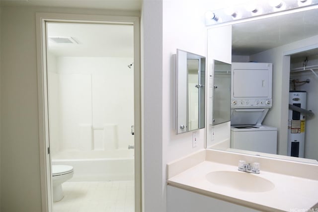 full bath featuring visible vents, vanity, toilet, stacked washer and clothes dryer, and electric water heater