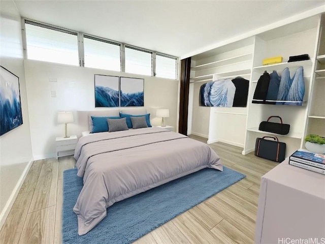 bedroom featuring light hardwood / wood-style floors