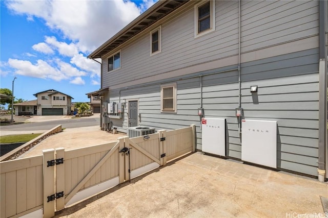 view of side of property with a garage