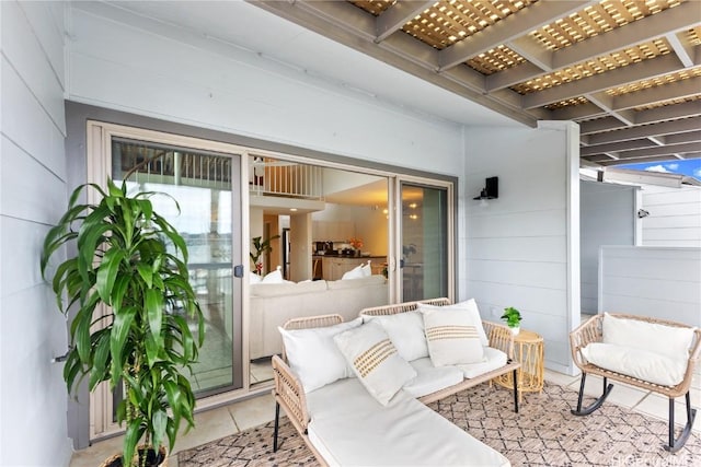 view of patio featuring outdoor lounge area and a pergola