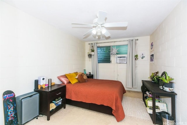 bedroom with ceiling fan and cooling unit