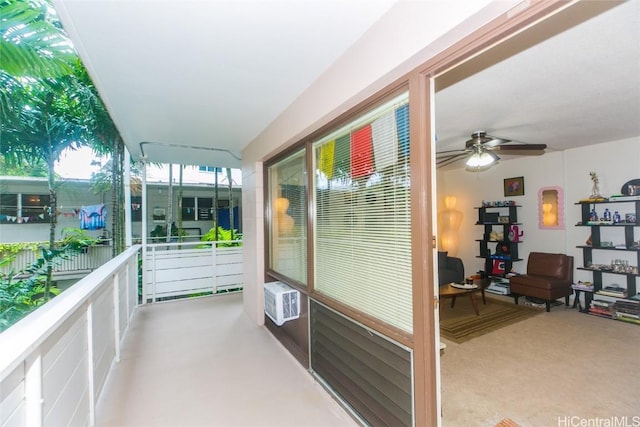 interior space featuring ceiling fan and cooling unit