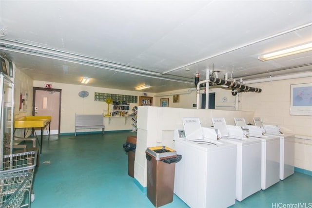 laundry area with washing machine and dryer