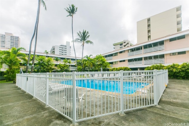 view of swimming pool featuring a patio area