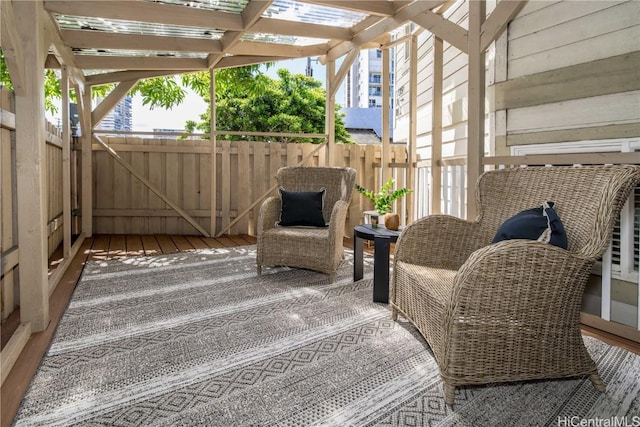 wooden deck with a pergola