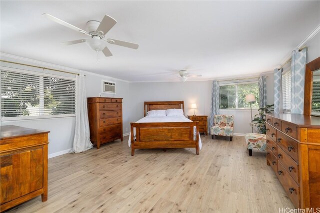 bedroom featuring crown molding, ceiling fan, and light hardwood / wood-style flooring