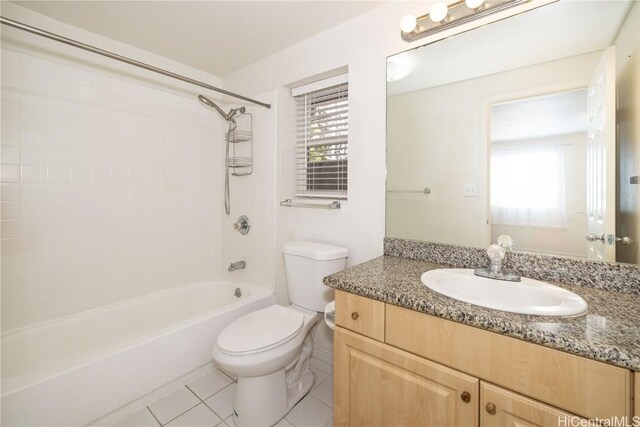 full bathroom with vanity, plenty of natural light, shower / bathtub combination, and toilet