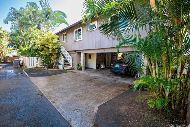 view of front facade with a carport