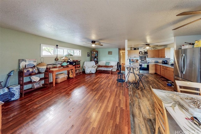 interior space with dark hardwood / wood-style floors and a textured ceiling